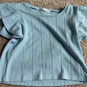 small boutique blue going out top